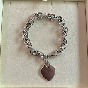 Tiffany & Co 925 sterling silver heart charm bracelet. 7.5”